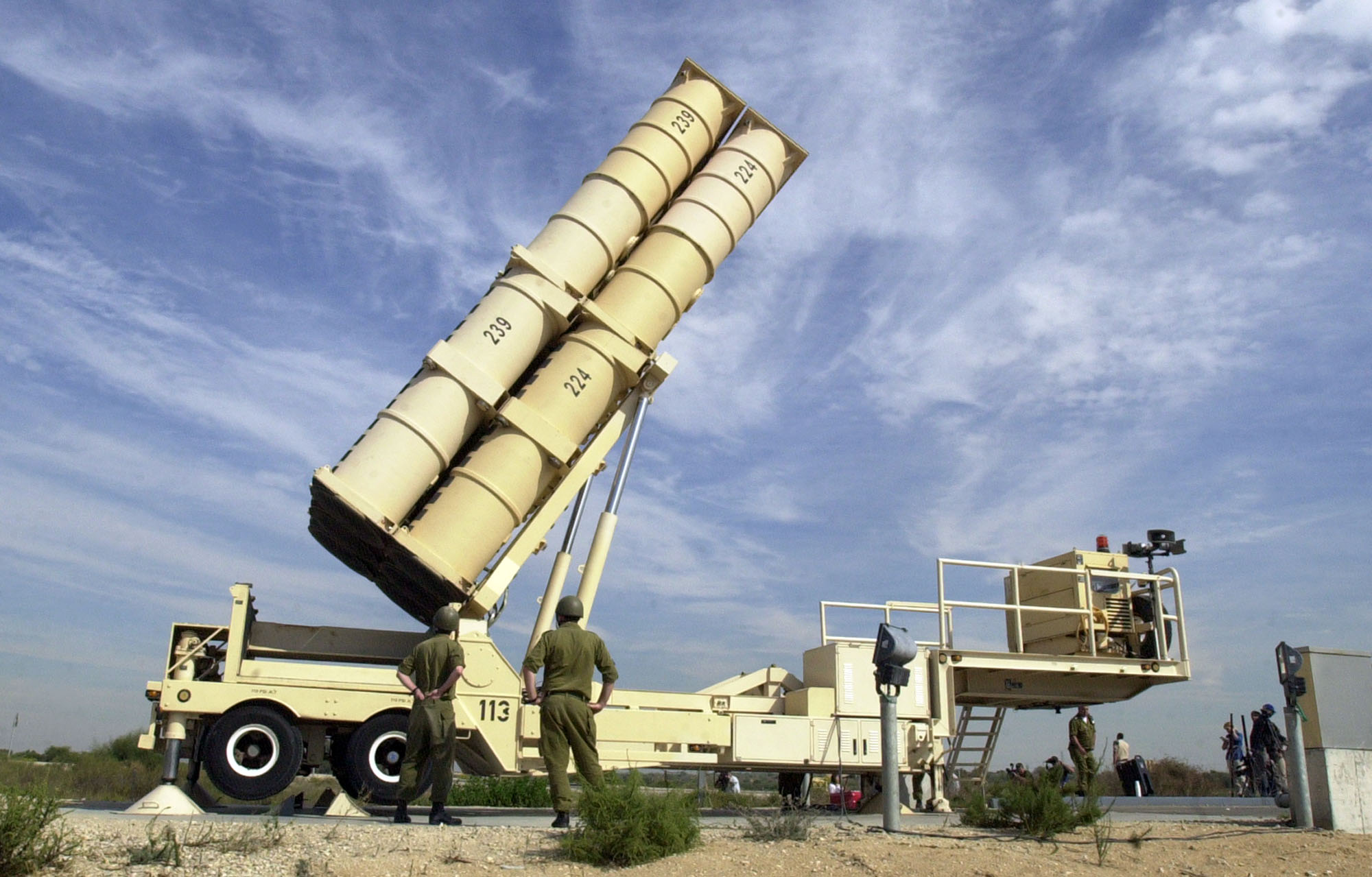 Israeli soldiers demonstrate the operation of the Arrow anti-missile mobile launcher at the Palmachim army base in central Israel Thursday,  Nov. 7, 2002. The anti-missile batteries were shown to reporters as part of a public relations blitz aimed at discouraging Saddam Hussein from firing his Scuds. (AP Photo/Eitan Hess-Ashkenazi)